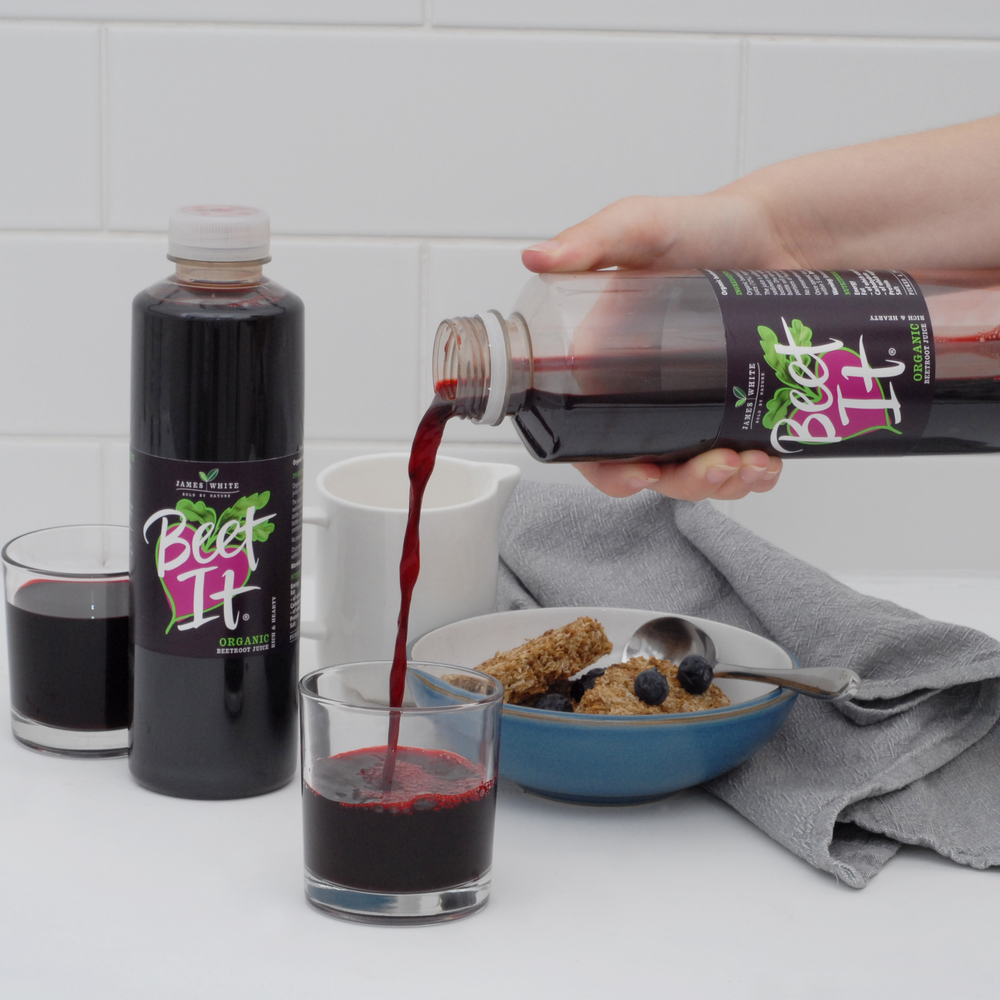 
                  
                    Beet It juice being poured into a glass at breakfast 
                  
                